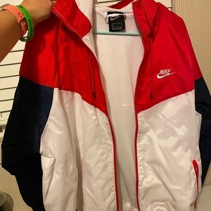Brand new without tags, men’s large Nike Jacket. Red, navy and white.